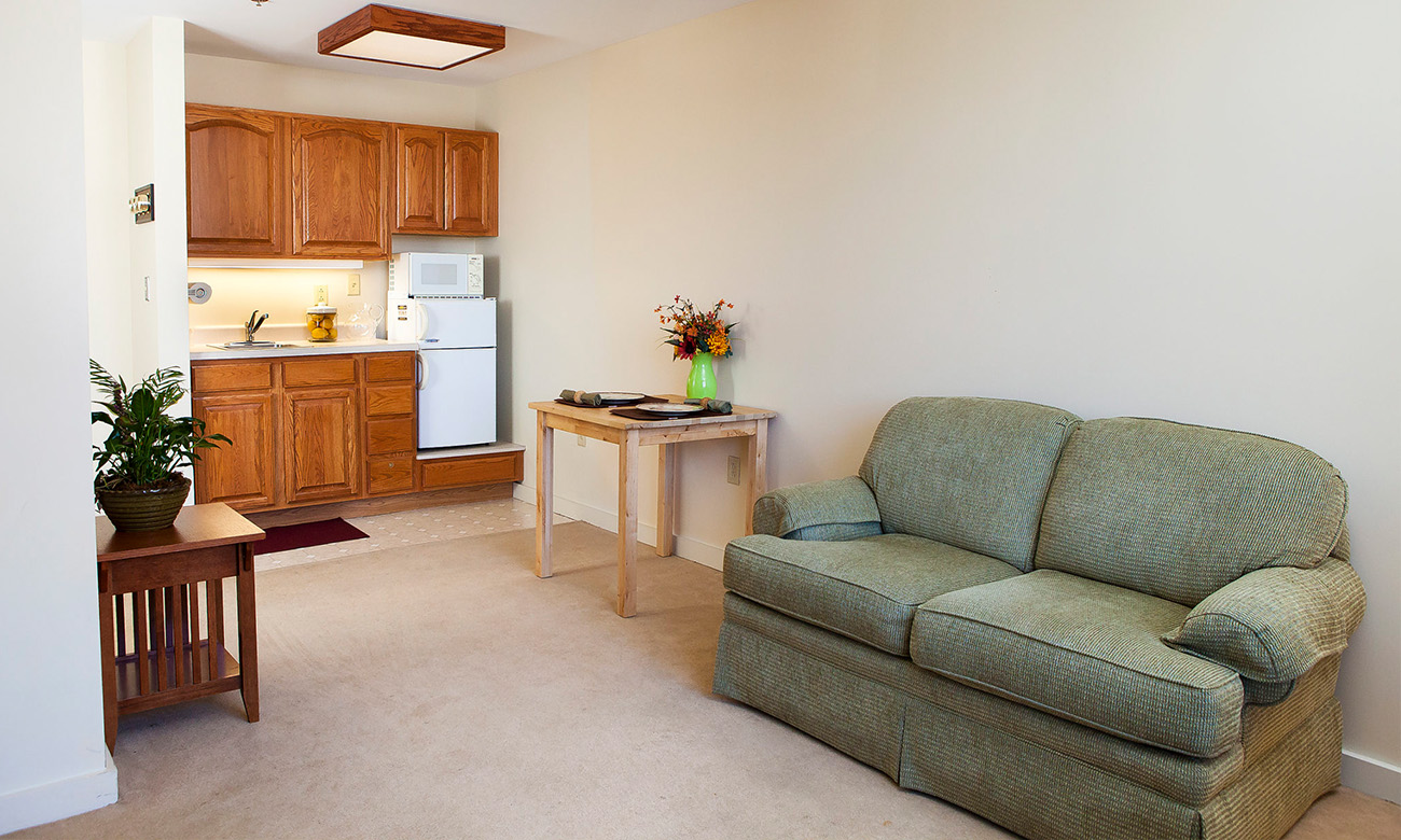 Personal Care Suite Kitchen Area and Part of Sitting Area Photo